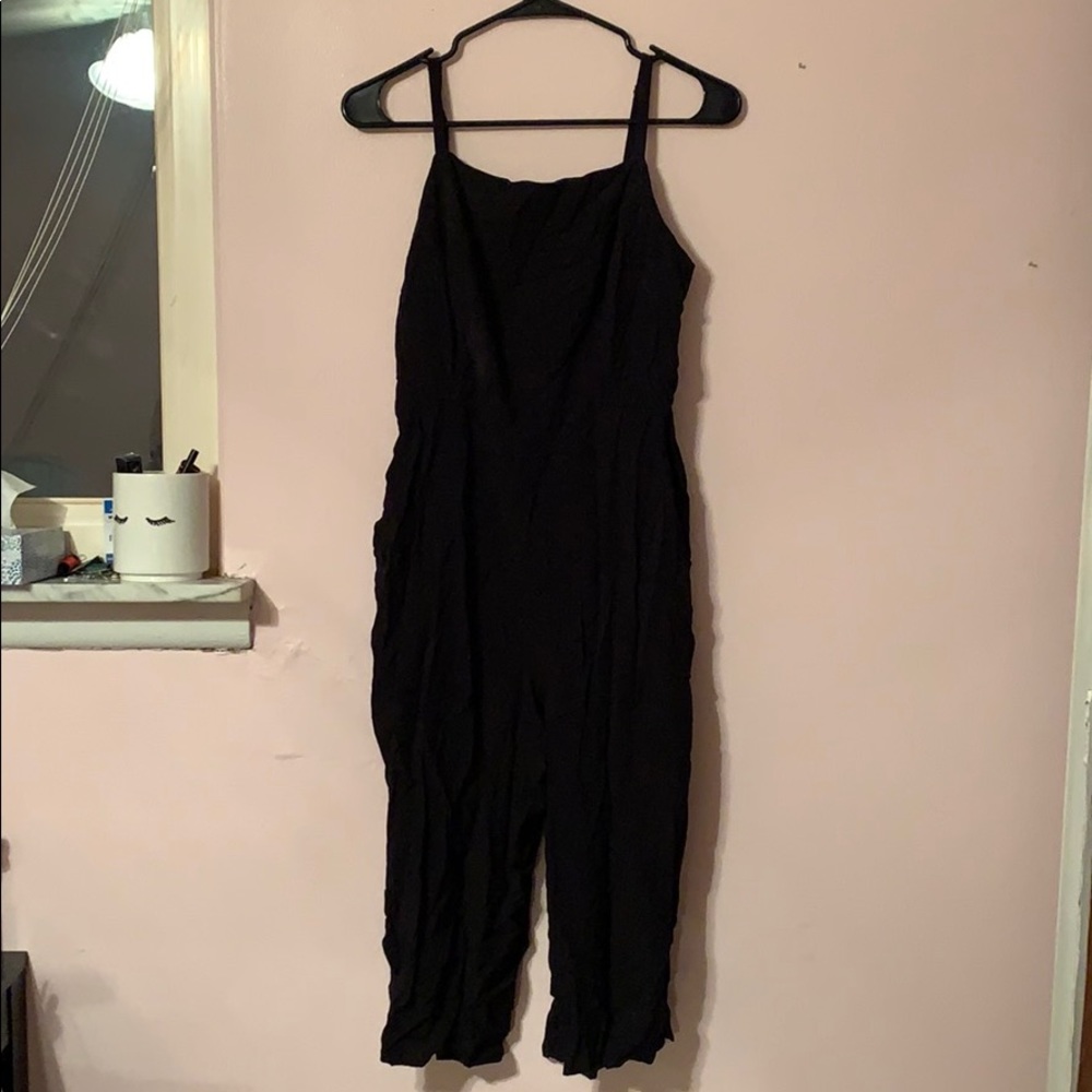 Black romper with ruched back section